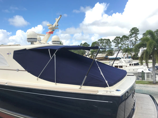 This is a tonneau cockpit cover with sunfly pole shade extension.