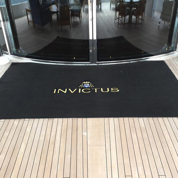 custom embordered entrance mat in black on yacht