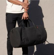 Sunbrella glen duffle bag held by guy