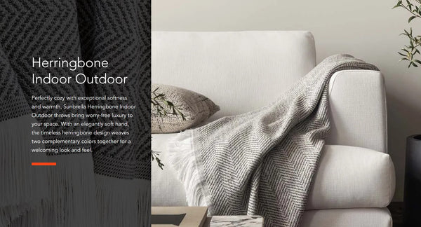 Sunbrella Herringbone Indoor Outdoor Throw on couch