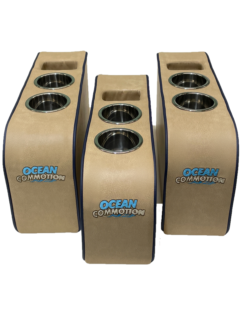 Three tan armrests with stainless cupholders and embroidered Ocean Commotion logos