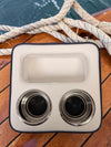 Top view of 250 Years of Freedom boat drink caddy showing dual stainless steel cup holders and built-in storage compartment
