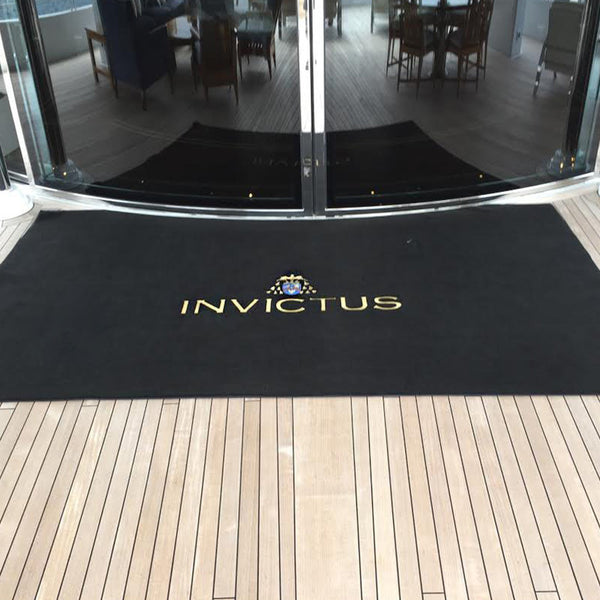 custom embordered entrance mat in black on yacht 