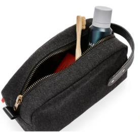 Sunbrella Andy Travel Kit - Char color with bottle inside and toothbrush